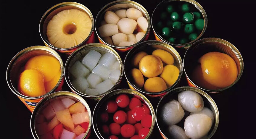 Premium canned goods including tomatoes, beans and vegetables