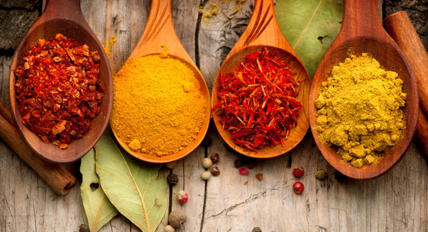 A vibrant collection of premium whole and ground spices